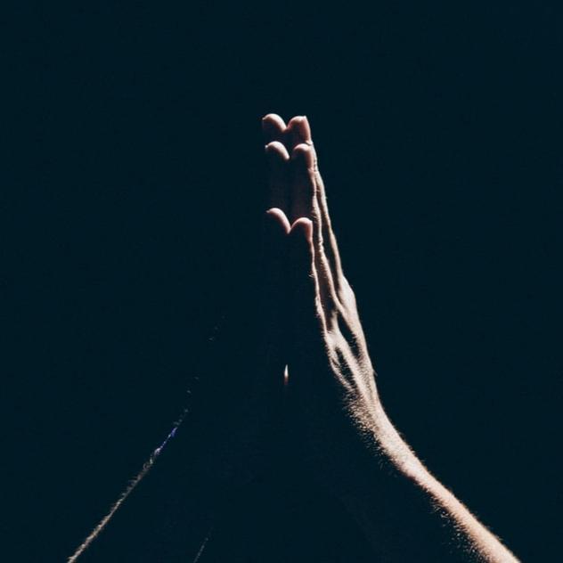 Hands together in prayer
